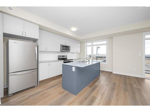 115-1565 Rose Way, Milton, ON - Indoor Photo Showing Kitchen