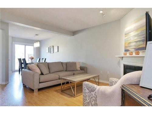 21-2940 Headon Forest Drive, Burlington, ON - Indoor Photo Showing Living Room With Fireplace