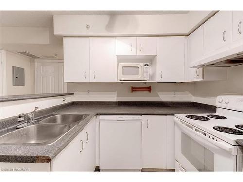 306-1460 Bishops Gate, Oakville, ON - Indoor Photo Showing Kitchen With Double Sink