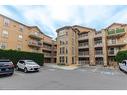 306-1460 Bishops Gate, Oakville, ON  - Outdoor With Balcony With Facade 