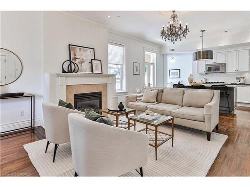 5-32 Gothic Avenue, Toronto, ON - Indoor Photo Showing Living Room With Fireplace