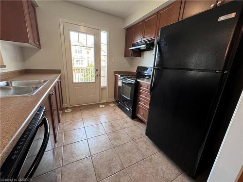 829 Fowles Court, Milton, ON - Indoor Photo Showing Kitchen With Double Sink