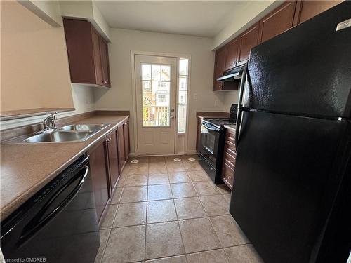 829 Fowles Court, Milton, ON - Indoor Photo Showing Kitchen With Double Sink