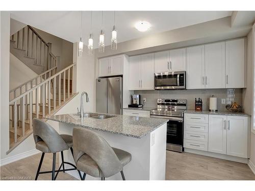 119-10 Birmingham Drive, Cambridge, ON - Indoor Photo Showing Kitchen With Double Sink With Upgraded Kitchen