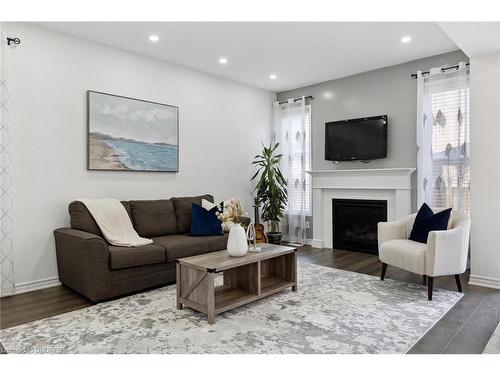 879 Hickory Crescent, Milton, ON - Indoor Photo Showing Living Room With Fireplace