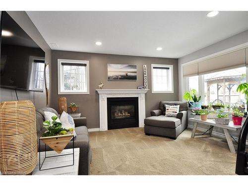 56 Conservation Trail, Belwood, ON - Indoor Photo Showing Living Room With Fireplace
