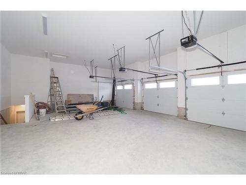 50 Carriage Crossing, Drayton, ON - Indoor Photo Showing Garage