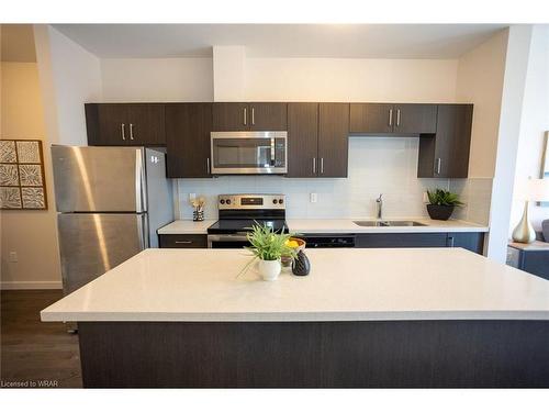 111-690 King Street W, Kitchener, ON - Indoor Photo Showing Kitchen With Stainless Steel Kitchen With Double Sink