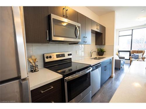 111-690 King Street W, Kitchener, ON - Indoor Photo Showing Kitchen With Stainless Steel Kitchen With Double Sink
