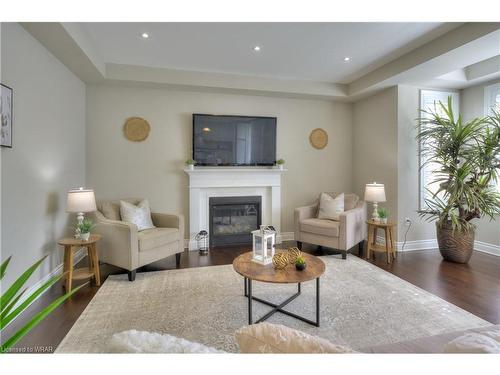 56 Compass Trail, Cambridge, ON - Indoor Photo Showing Living Room With Fireplace