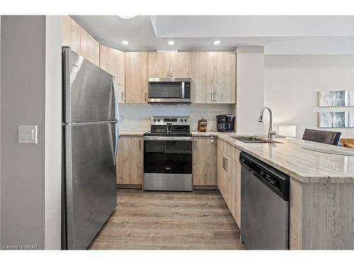 2204-60 Charles Street W, Kitchener, ON - Indoor Photo Showing Kitchen With Stainless Steel Kitchen With Double Sink