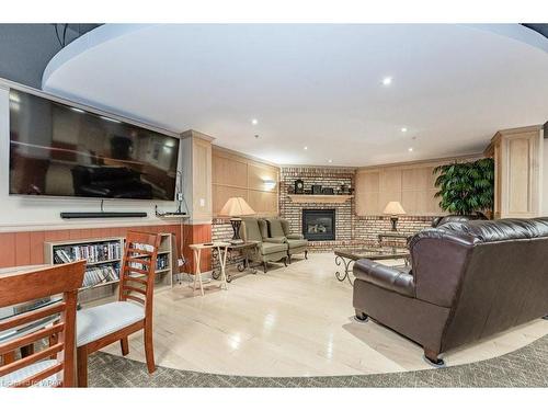 1106-250 Glenridge Drive, Waterloo, ON - Indoor Photo Showing Living Room With Fireplace