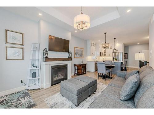33 Bur Oak Drive, Elmira, ON - Indoor Photo Showing Living Room With Fireplace