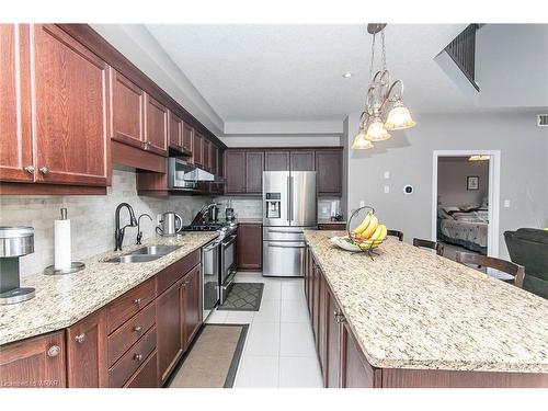 832 Normandy Drive, Woodstock, ON - Indoor Photo Showing Kitchen With Double Sink