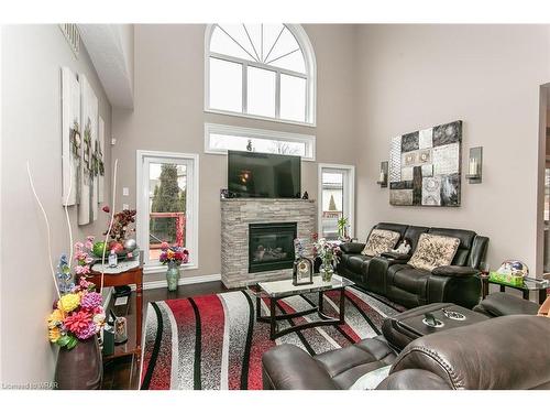 832 Normandy Drive, Woodstock, ON - Indoor Photo Showing Living Room With Fireplace