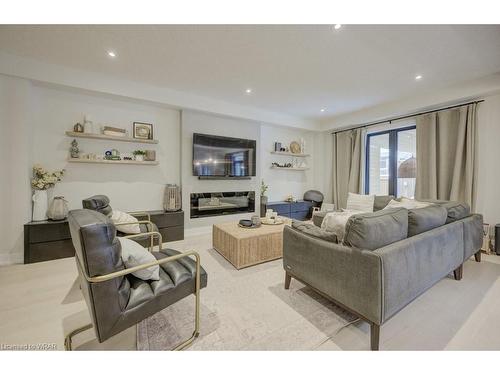 641 Wild Rye Street Street, Waterloo, ON - Indoor Photo Showing Living Room With Fireplace