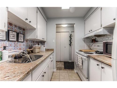15 Killdeer Road, Elmira, ON - Indoor Photo Showing Kitchen With Double Sink