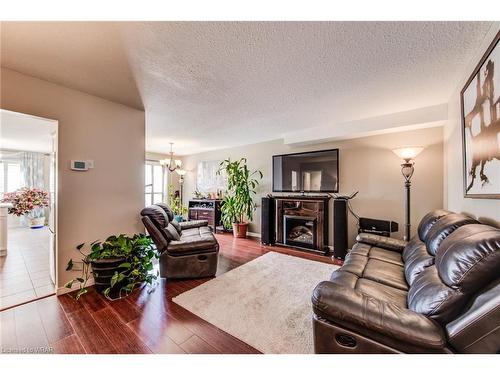 74 Fallowfield Drive, Kitchener, ON - Indoor Photo Showing Living Room With Fireplace