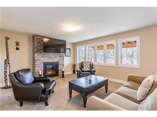 53 Nicoles Trail, Thorndale, ON - Indoor Photo Showing Living Room With Fireplace