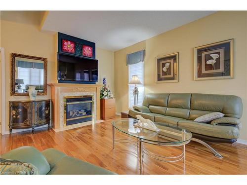 811 Creekside Drive, Waterloo, ON - Indoor Photo Showing Living Room With Fireplace