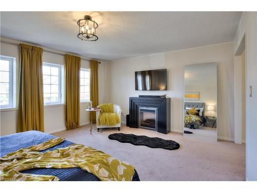 159 Dolman Street, Breslau, ON - Indoor Photo Showing Bedroom With Fireplace