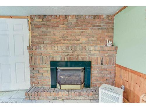 410 Queen Street S, Palmerston, ON - Indoor Photo Showing Living Room With Fireplace