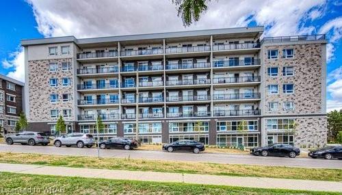 B404-275 Larch Street, Waterloo, ON - Outdoor With Balcony With Facade