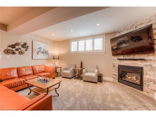 14 Langton Drive, Kitchener, ON - Indoor Photo Showing Living Room With Fireplace