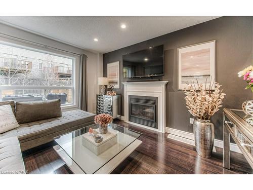 27 Upper Mercer Street, Kitchener, ON - Indoor Photo Showing Living Room With Fireplace