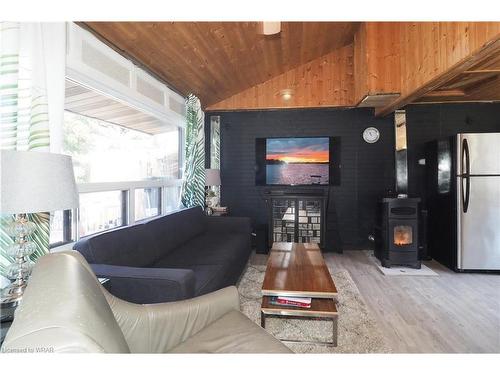 950 Ninth Street, Belwood Lake, ON - Indoor Photo Showing Living Room With Fireplace