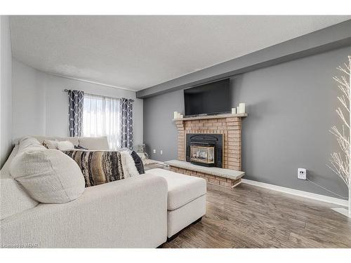 483 Saginaw Parkway, Cambridge, ON - Indoor Photo Showing Living Room With Fireplace