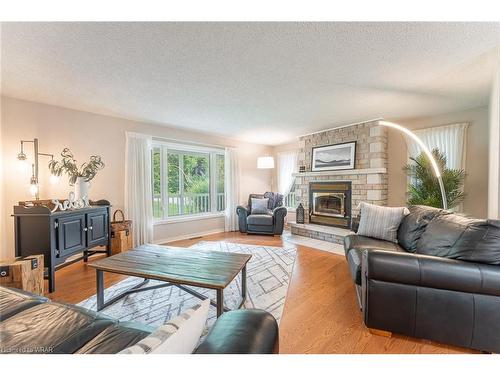 168 Queen'S Bush Dr Drive, Annan, ON - Indoor Photo Showing Living Room With Fireplace
