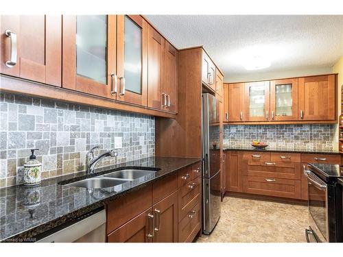1402-75 Queen Street N, Hamilton, ON - Indoor Photo Showing Kitchen With Double Sink