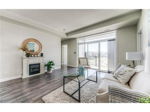 2R-155 Thomas Slee Drive, Kitchener, ON - Indoor Photo Showing Living Room With Fireplace