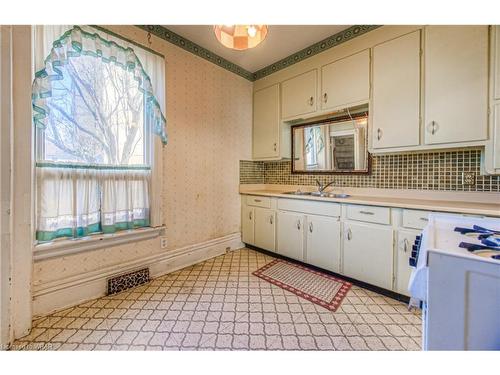 142 Sanford Avenue N, Hamilton, ON - Indoor Photo Showing Kitchen With Double Sink