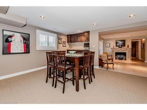 11 Rosslinn Road, Cambridge, ON - Indoor Photo Showing Dining Room With Fireplace
