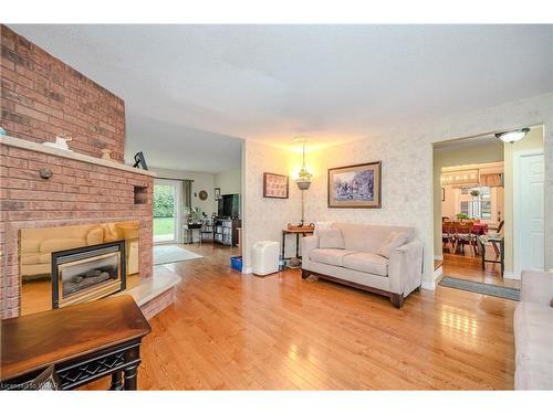 155 Clyde Street, Mount Forest, ON - Indoor Photo Showing Living Room With Fireplace