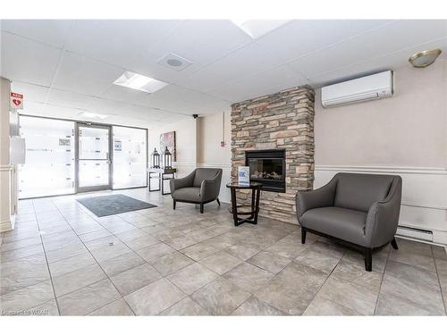 1201-64 Benton Street, Kitchener, ON - Indoor With Fireplace