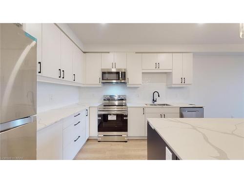 151-3900 Savoy Street, London, ON - Indoor Photo Showing Kitchen With Double Sink