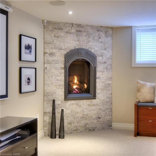 15 River Run Place, Conestogo, ON - Indoor Photo Showing Living Room With Fireplace