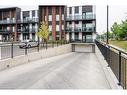 311-5 Wake Robin Drive, Kitchener, ON  - Outdoor With Balcony With Facade 