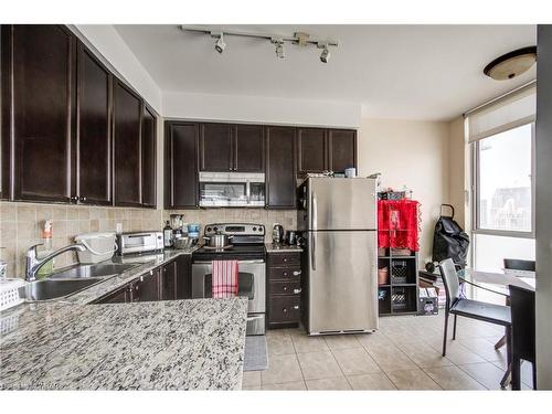 3104-225 Webb Drive, Mississauga, ON - Indoor Photo Showing Kitchen With Stainless Steel Kitchen With Double Sink