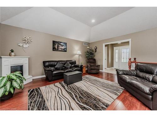 8 Jolene Court, Milverton, ON - Indoor Photo Showing Living Room With Fireplace