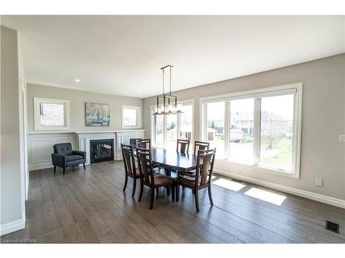 15 Hudson Drive, Brantford, ON - Indoor Photo Showing Dining Room With Fireplace