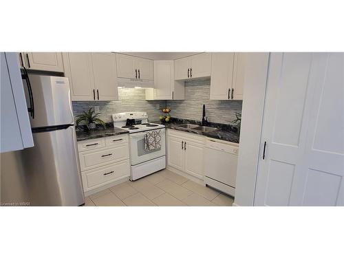 806-3227 King Street E, Kitchener, ON - Indoor Photo Showing Kitchen With Double Sink