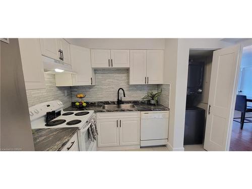 806-3227 King Street E, Kitchener, ON - Indoor Photo Showing Kitchen With Double Sink