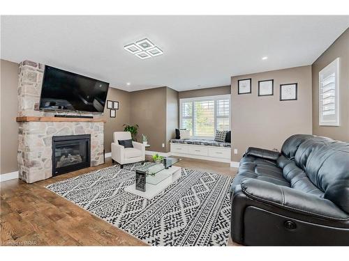 57 Halliday Drive Drive, Tavistock, ON - Indoor Photo Showing Living Room With Fireplace