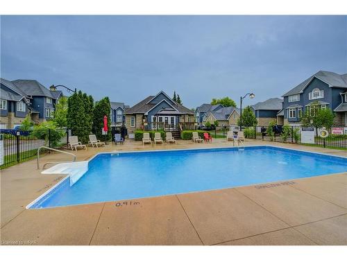 22-199 Saginaw Parkway, Cambridge, ON - Outdoor With In Ground Pool