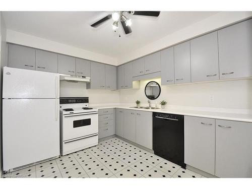 711-565 Greenfield Avenue, Kitchener, ON - Indoor Photo Showing Kitchen With Double Sink
