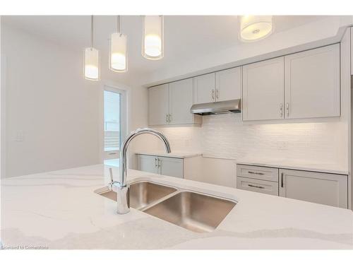 I075-13 Urbane Boulevard, Kitchener, ON - Indoor Photo Showing Kitchen With Double Sink